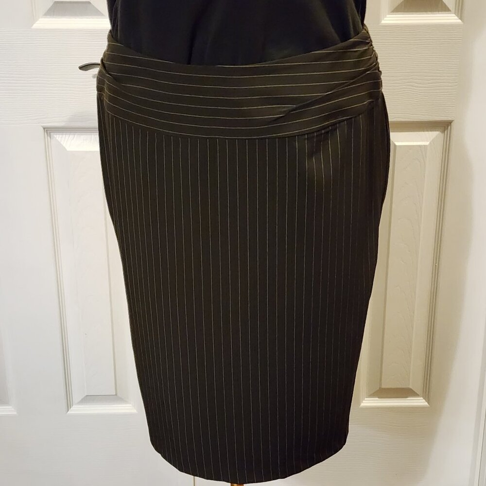 Pinstriped knee length pencil skirt with bow on the back